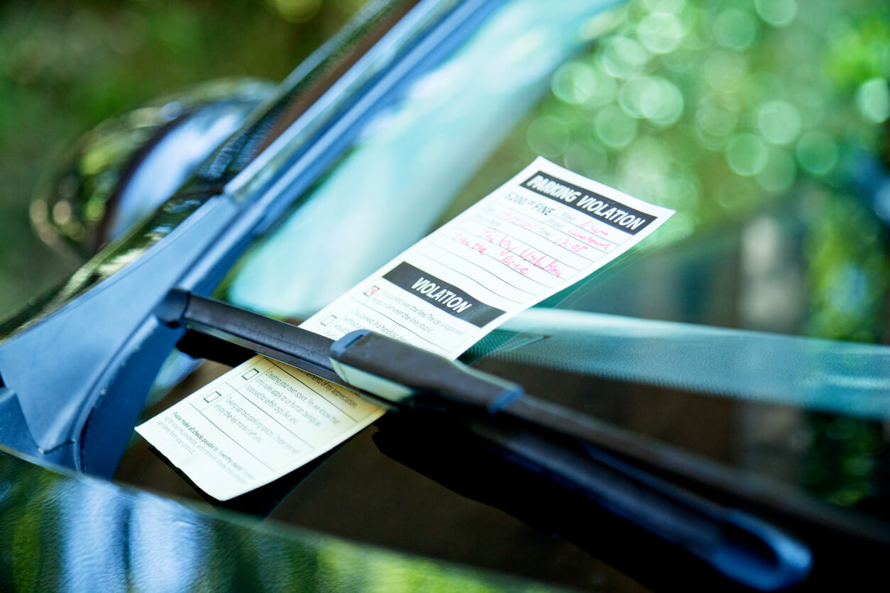 Ticket under the wiper blade on a windshield