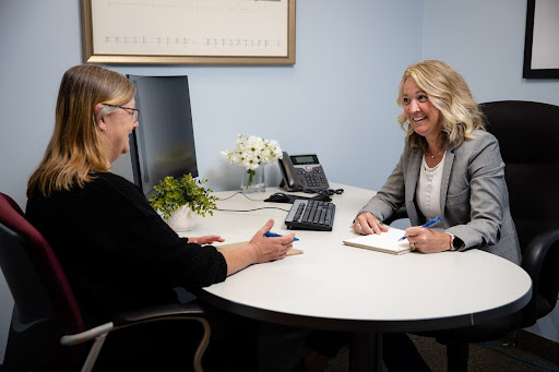 Insurance broker meeting with a business owner to discuss commercial insurance options in Ontario. Highlighting personalized service and expert advice for securing tailored business insurance coverage.